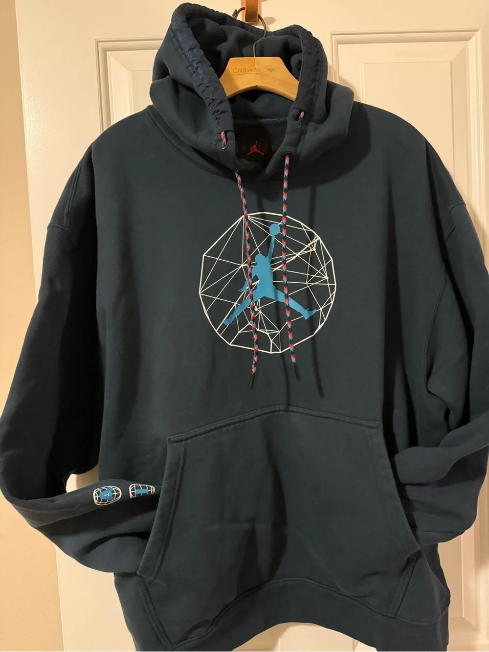 Jordan Dark Navy Pullover Hoodie with Teal Jumpma Graphic